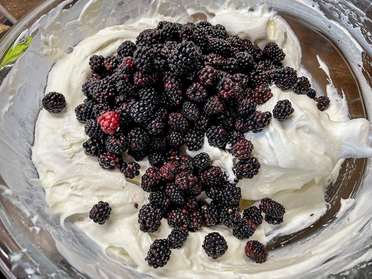 Gently fold in the blackberries.