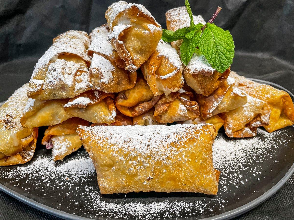 Sprinkle the rolls with additional powdered sugar before serving.