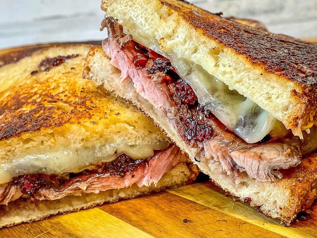 The buttery toasted bread, sliced roast pork, gooey melted Swiss and the sweet and tart blackberry bourbon sauce make the perfect blend of flavors.