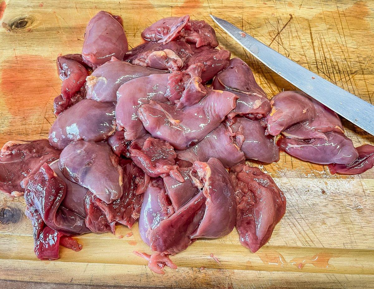 Trim the breast meat from the bone.