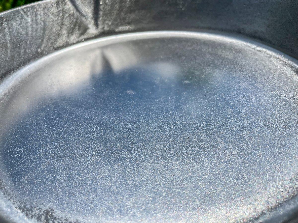 The polished cast iron should be shiny and smooth enough to reflect like a mirror. 