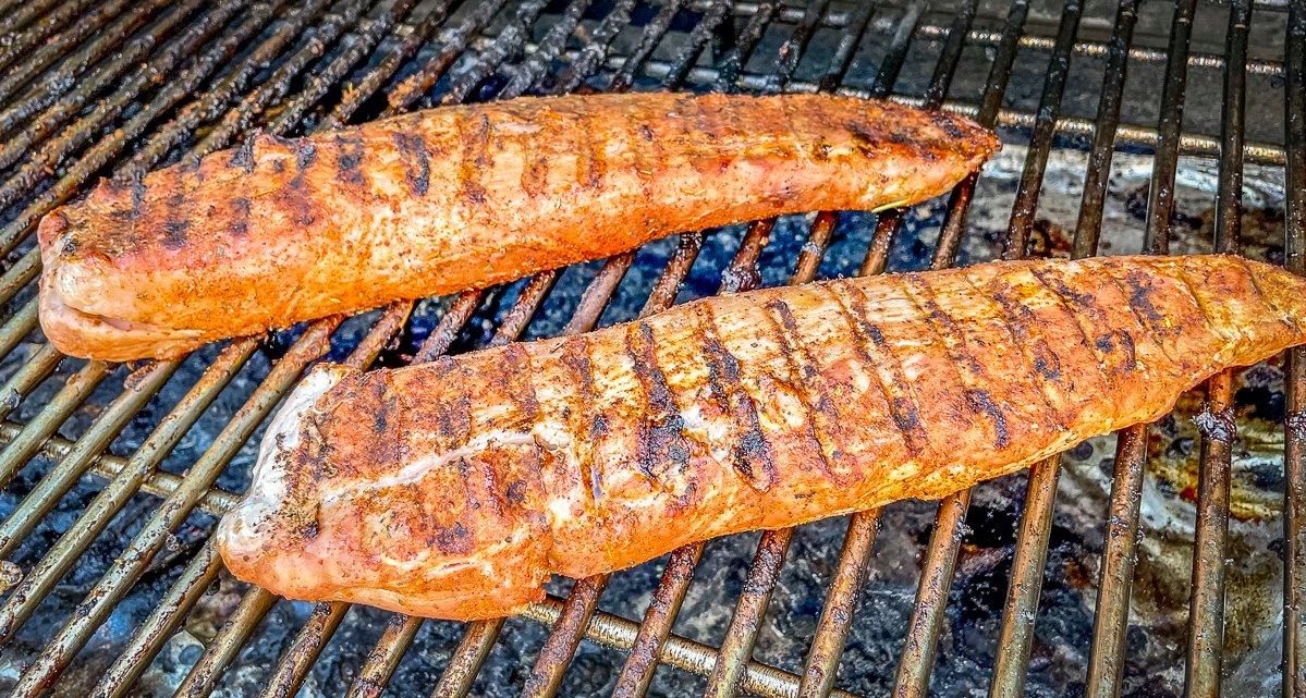 Grill the pork to 145 degrees internal temperature then rest the meat before slicing.