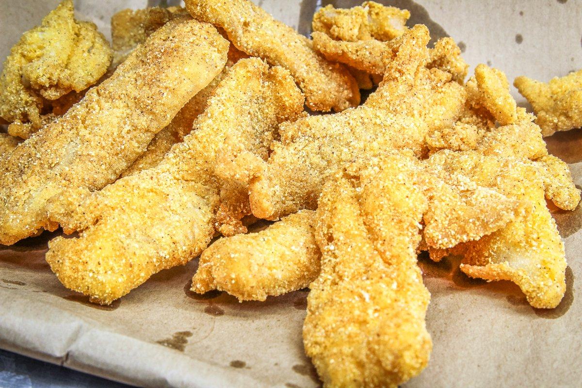 Fry the fish to a crispy, golden brown.