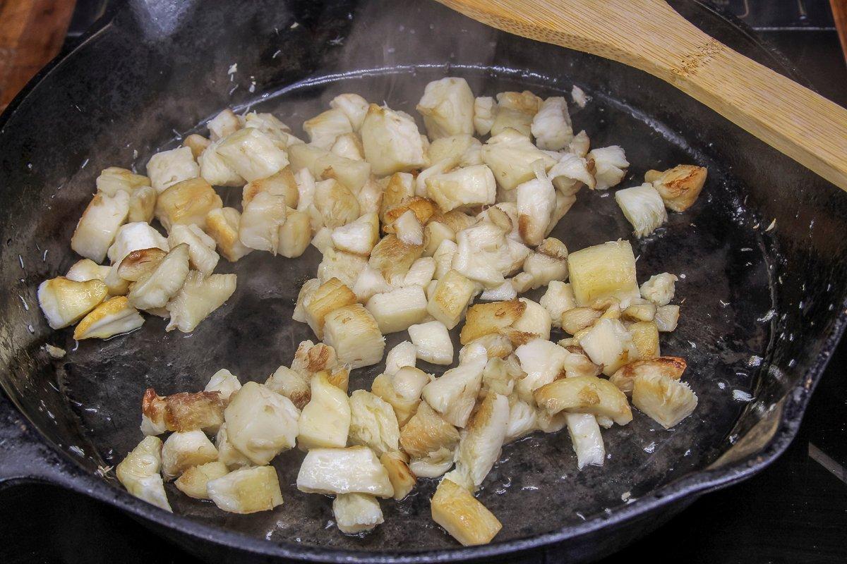 Dice the mushroom and sauté in butter until soft. 