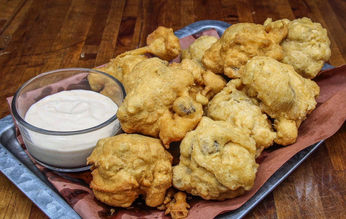 These golden fried mushroom fritters can be a side dish or an appetizer.