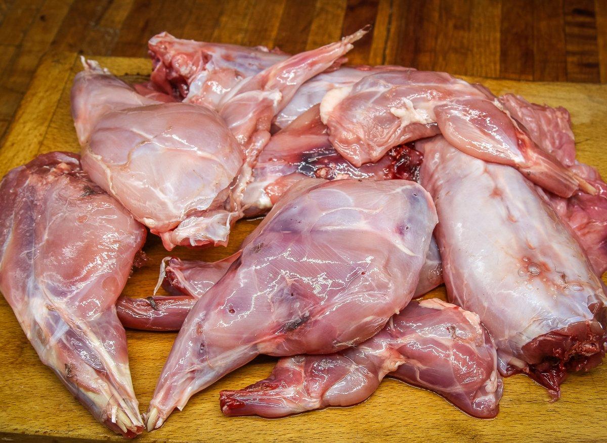 Cut each rabbit into five pieces — four legs and a back section.
