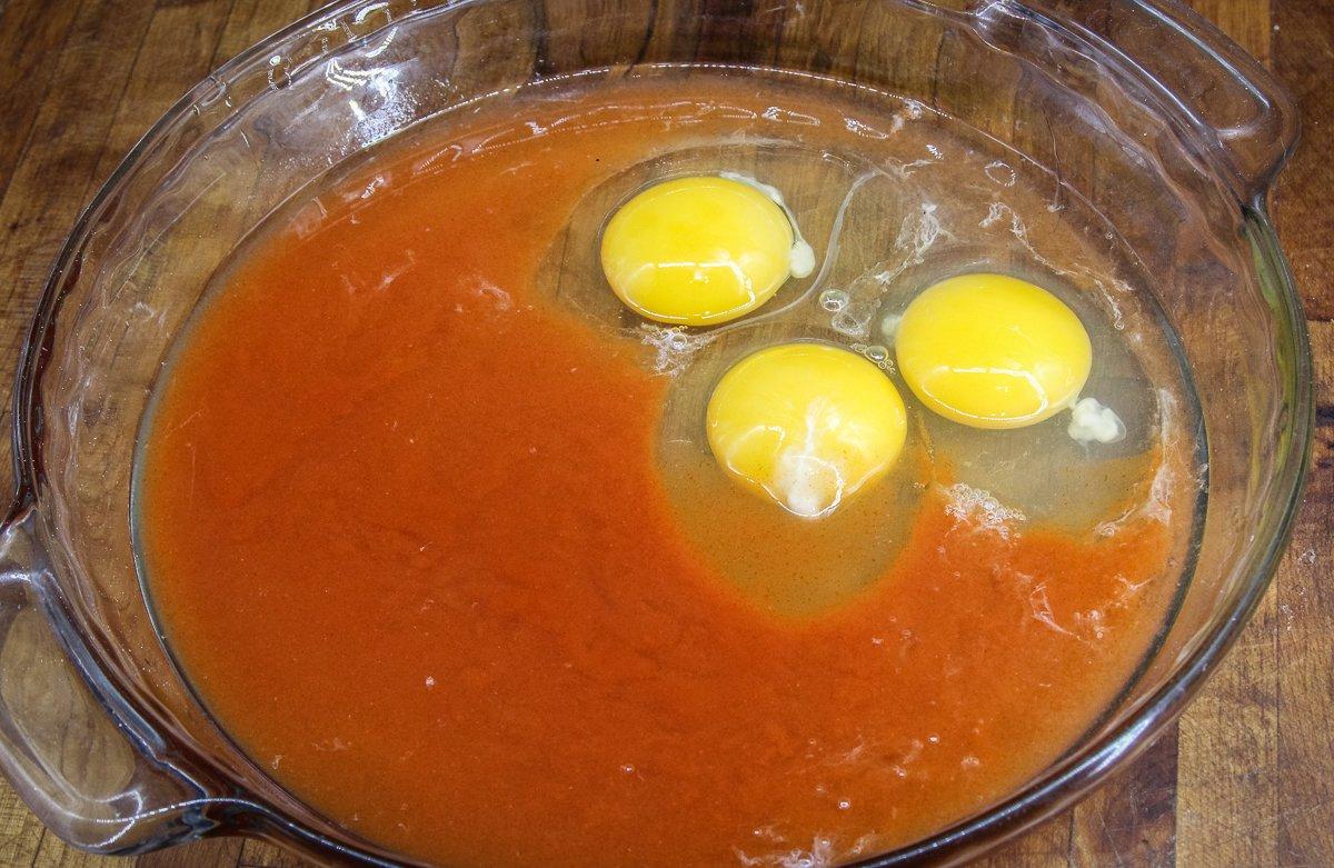 Beat the eggs with the hot sauce and a bit of water.