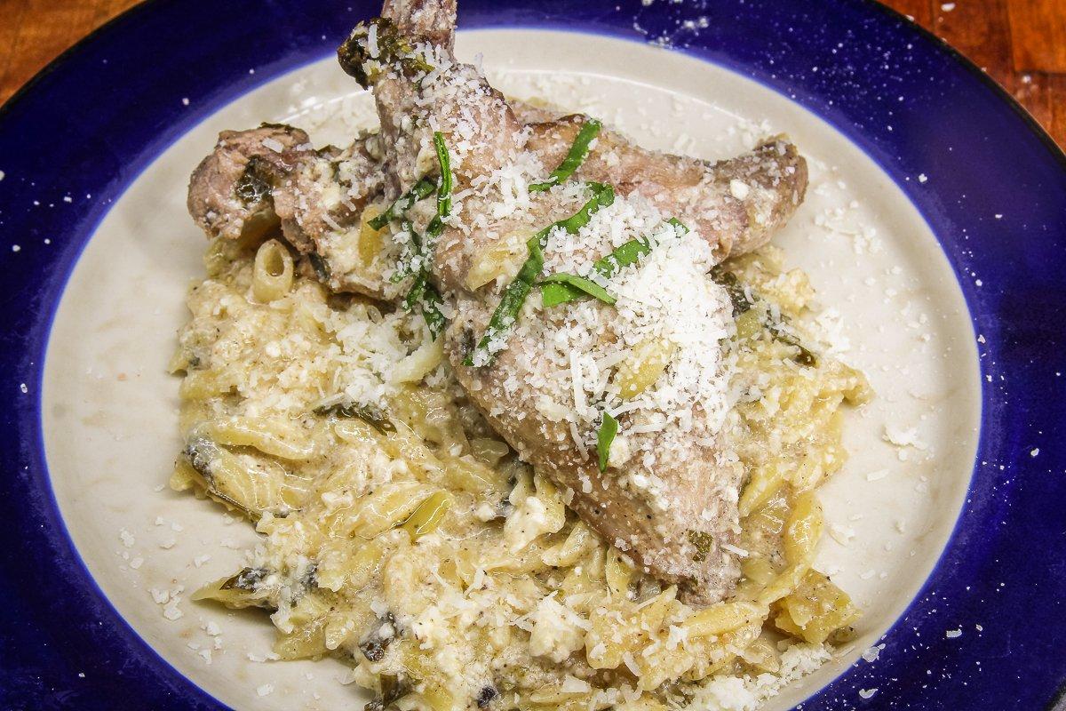 Tender baked rabbit served over flavorful orzo makes a satisfying meal after a long, cold day afield. 