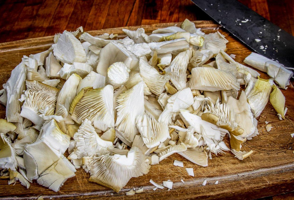 Chop the mushrooms for the stuffing mixture. 