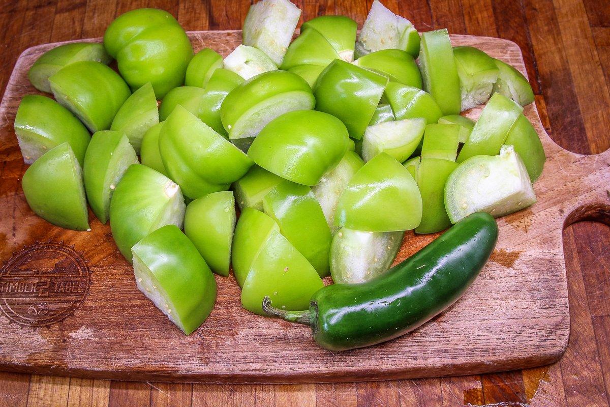 Quarter the tomatillos and dice the jalapeno.