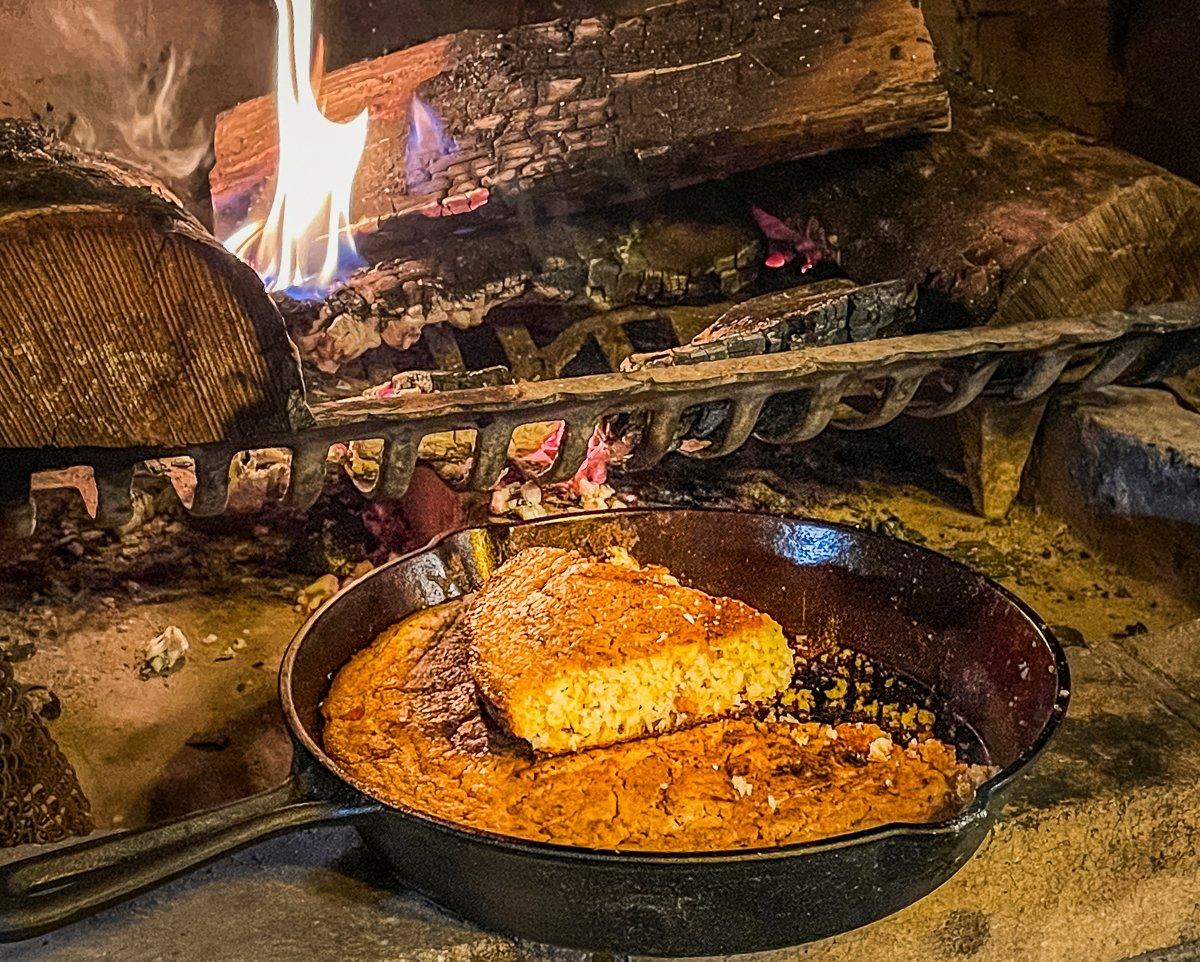 While cooking cornbread on an open fire takes longer than in an oven, the flavor is worth the work.