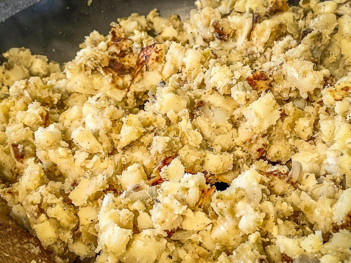 Cook until the potatoes start to get crisp.