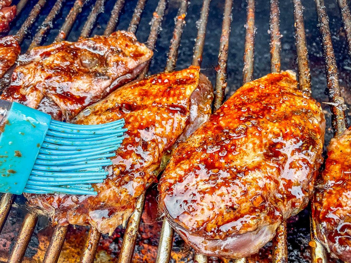 Brush the sauce over the duck as it grills.