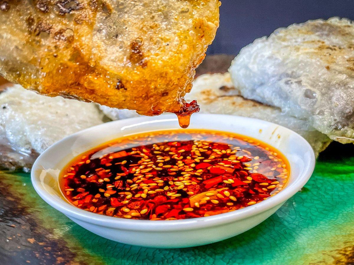 The sweet, salty and slightly spicy dipping sauce is the perfect accompaniment to the dumplings.