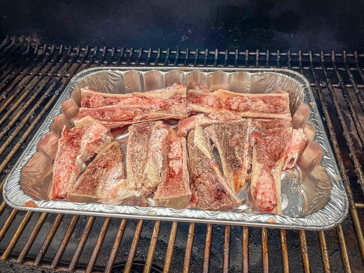 Roast the bones on your Traeger Grill for 20 minutes.