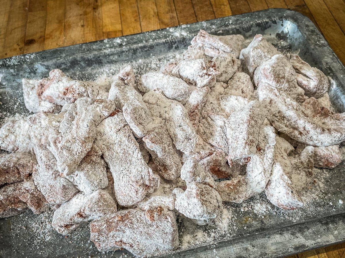 Fry the backstrap in batches to keep from overcrowding the pan.