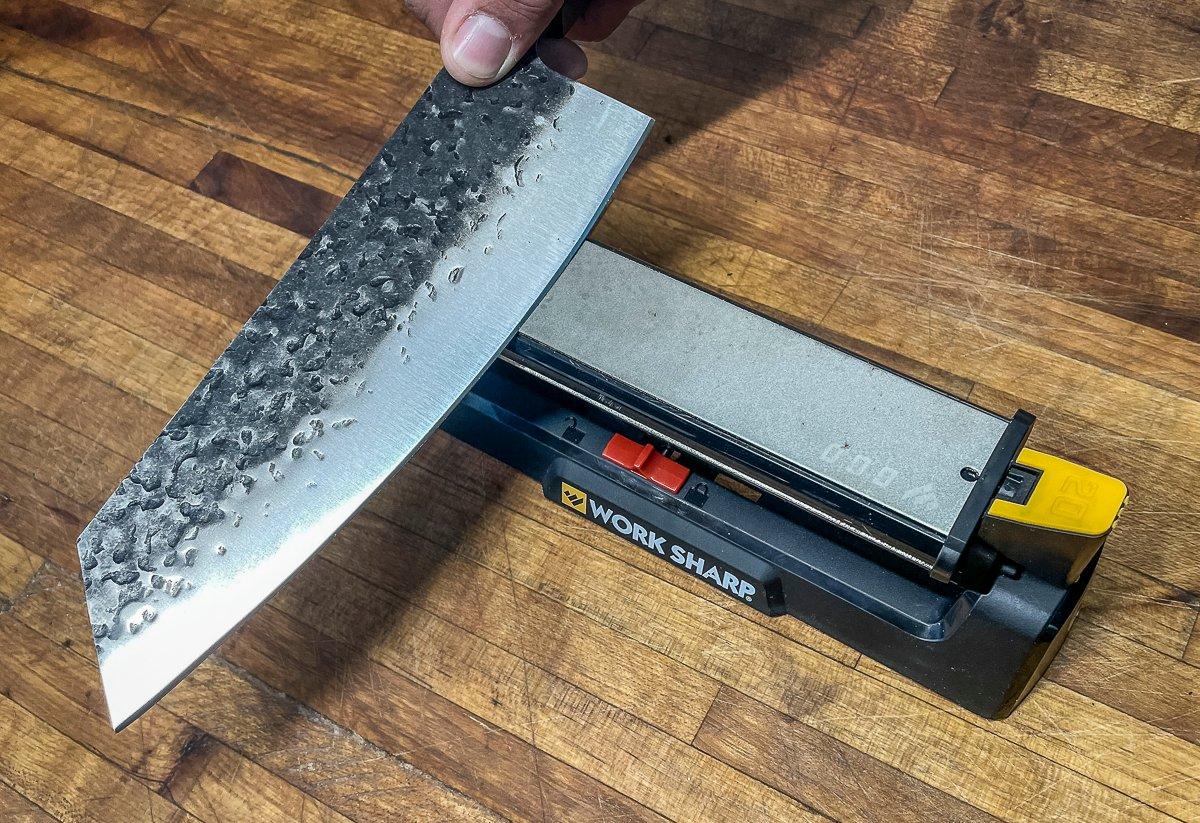 Sharpening stones can be natural, like an Arkansas stone, or synthetic, like this 600 grit diamond surface.