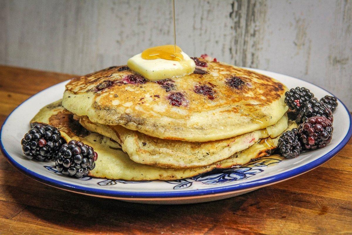 Adding fresh blackberries to fluffy buttermilk pancakes takes the flavor to a whole new level.