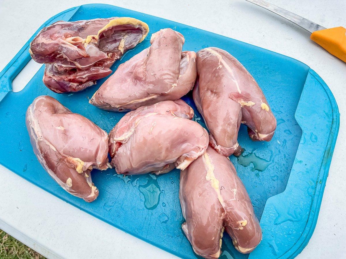 Remove the breast meat from the bones.