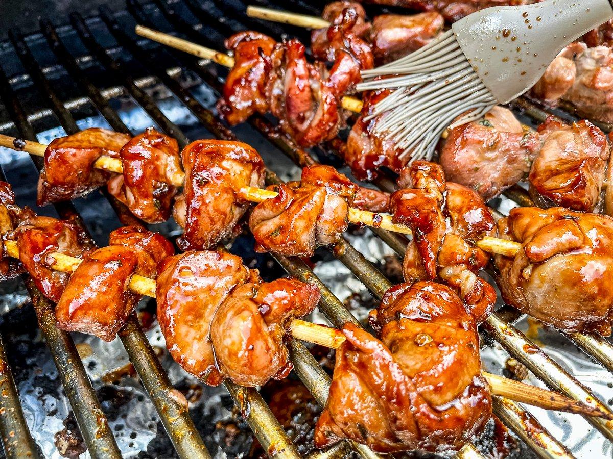 Brush on the reserved marinade as the pork grills.