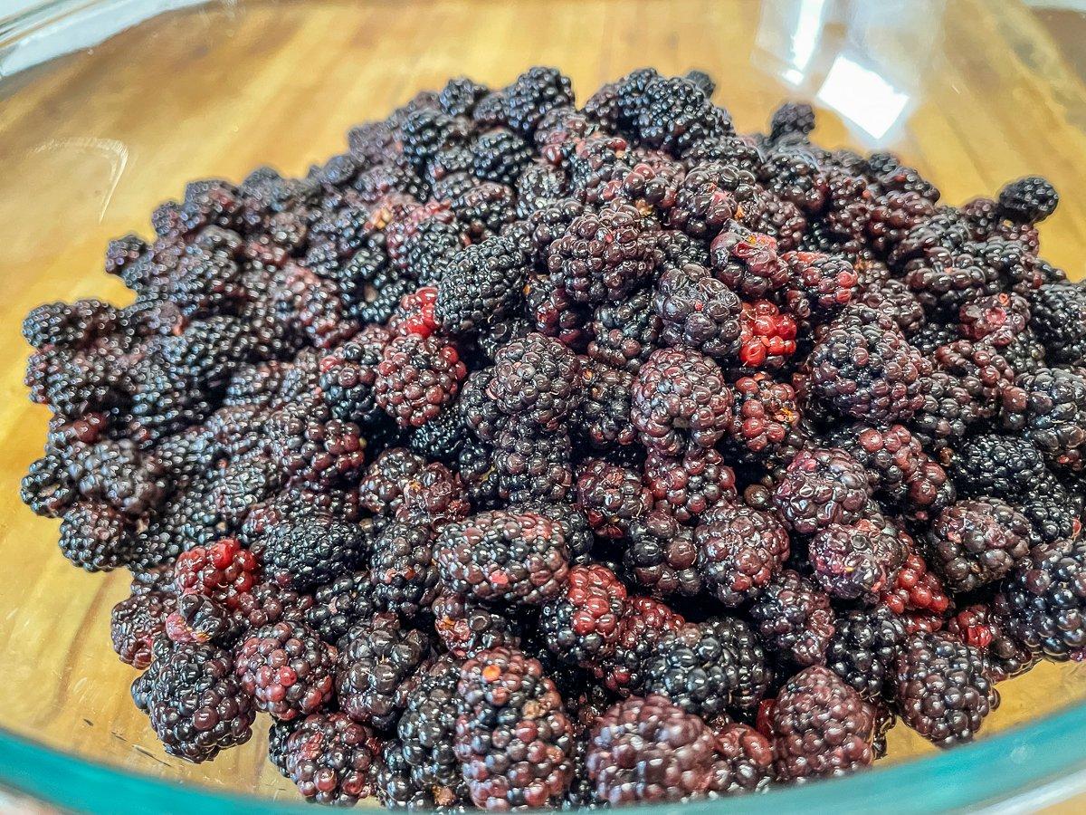 Clean the berries before making the preserves.