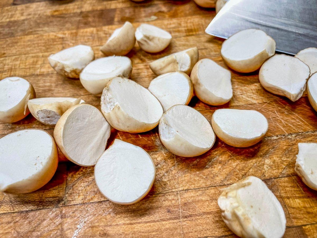 The interiors of edible puffball mushrooms should be solid white and puffy to the touch.