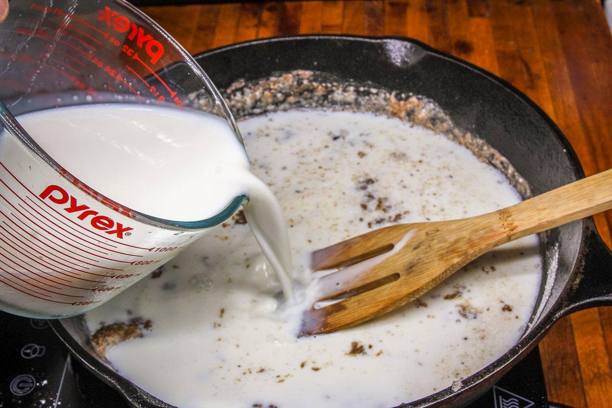 Stir the flour into the reserved drippings left from cooking the rabbit and slowly pour in the milk.