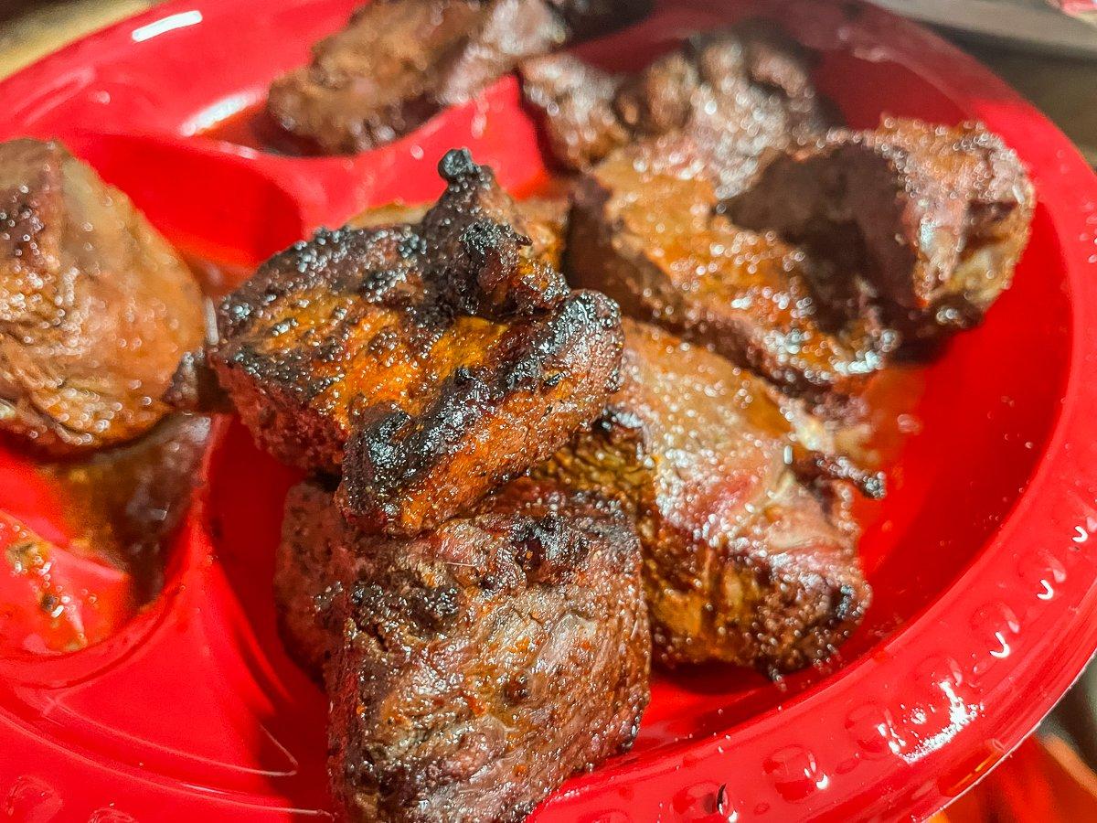 Slice leftover grilled backstrap or steak to add to the pot.