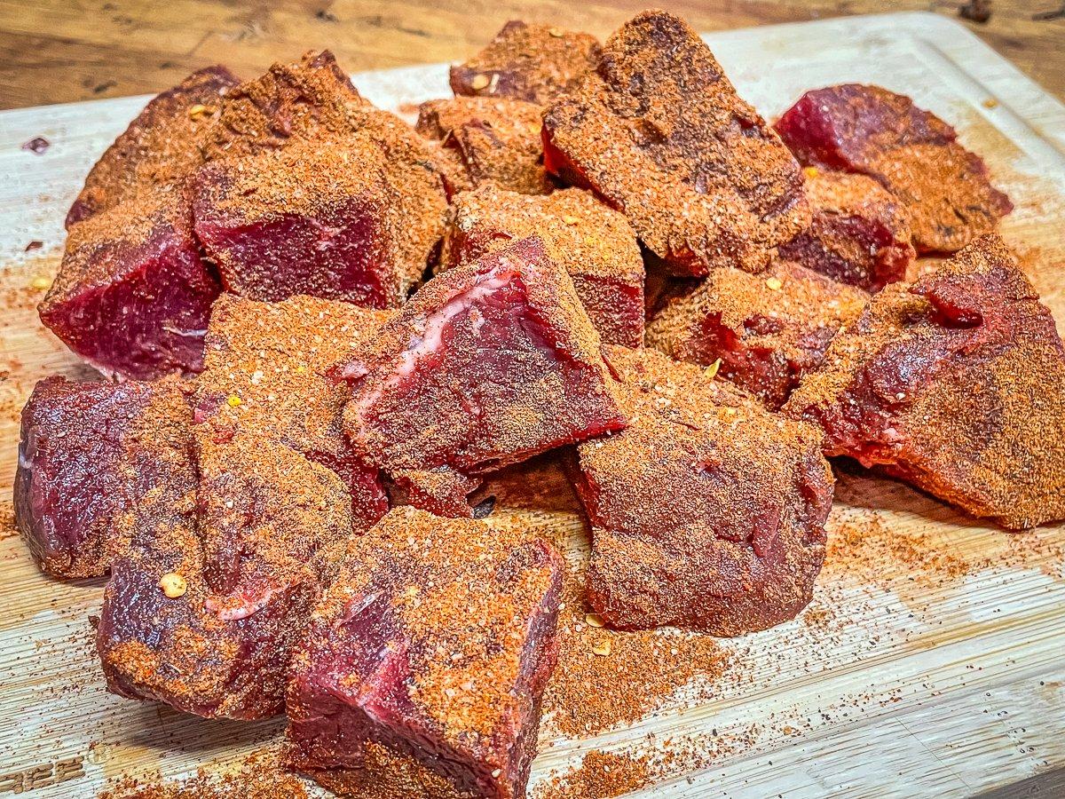 Sprinkle the spice blend evenly over the backstrap.