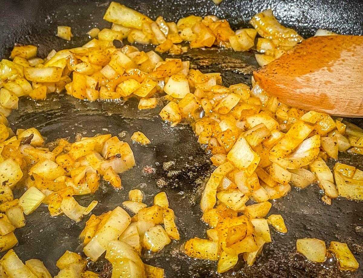 Remove the venison from the pan and caramelize the onions.