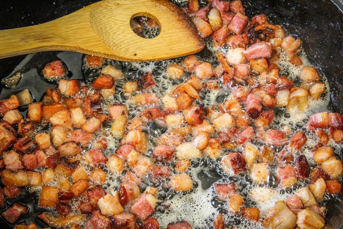 Render the bacon until crisp, reserving the grease and keeping it hot.