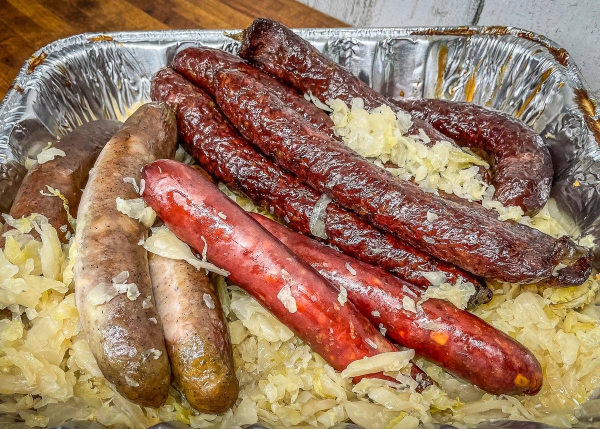 When the sausages are almost done, add them directly to the kraut pan to finish cooking.