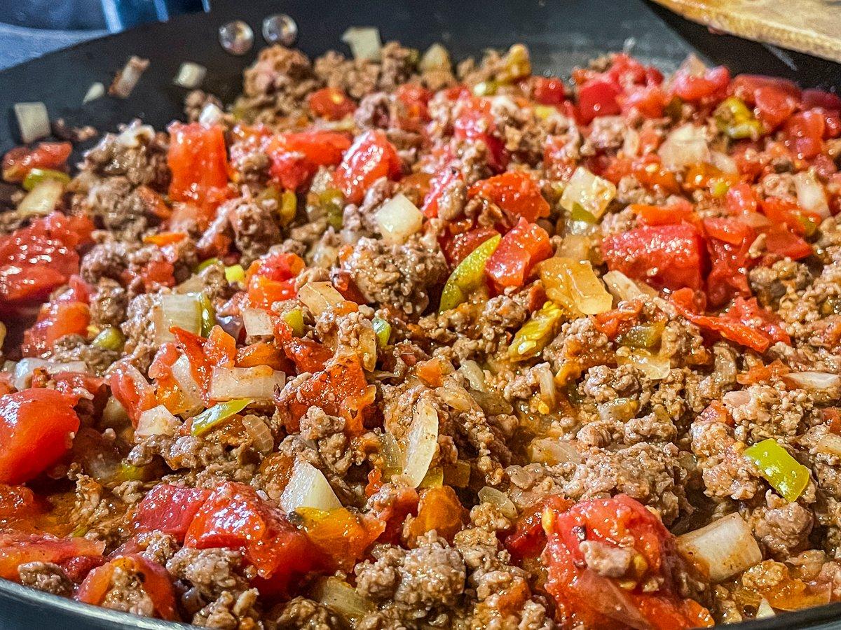 Add the Ro Tel and fire roasted tomatoes.