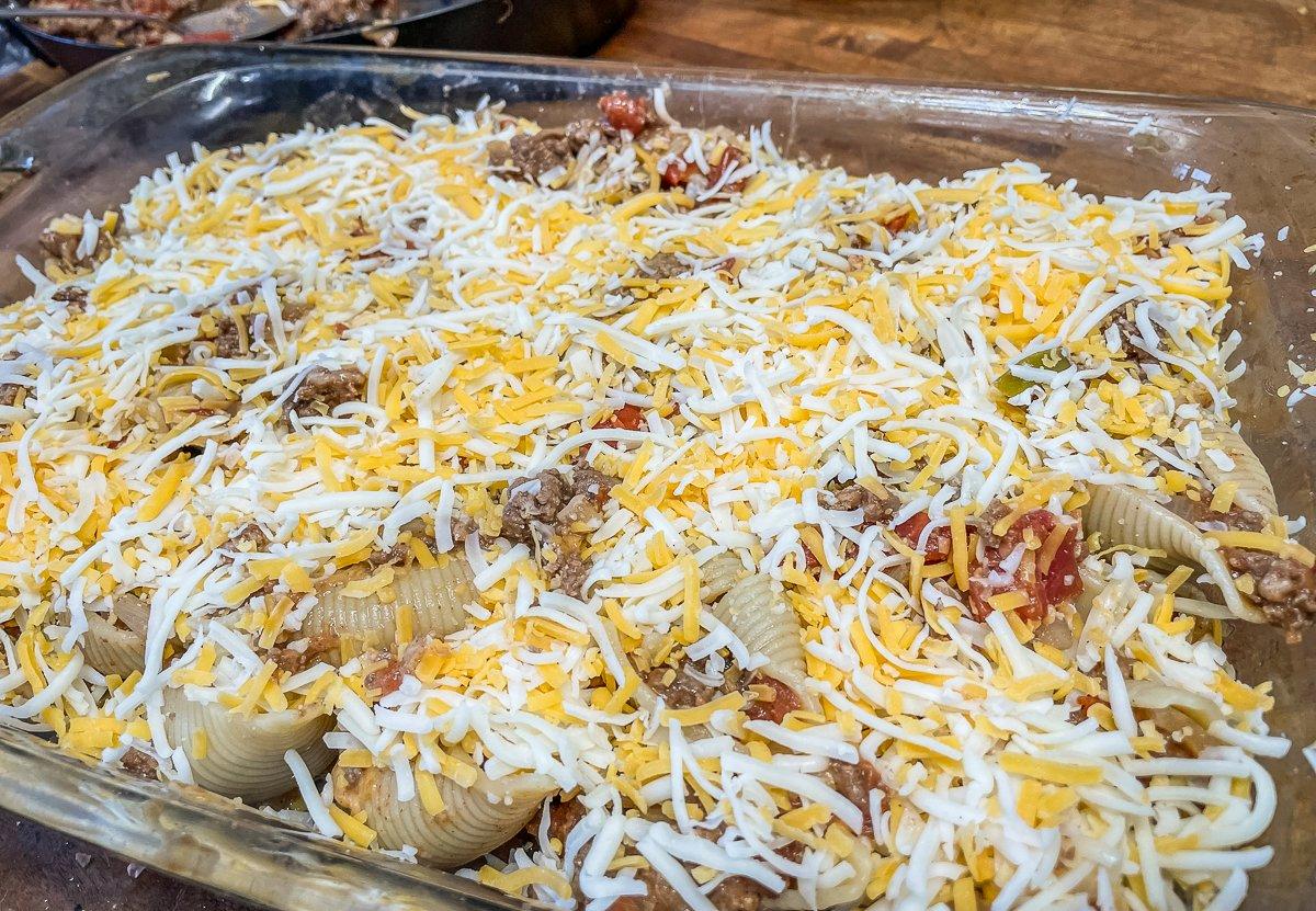 Top with as much shredded cheese as you like before baking.