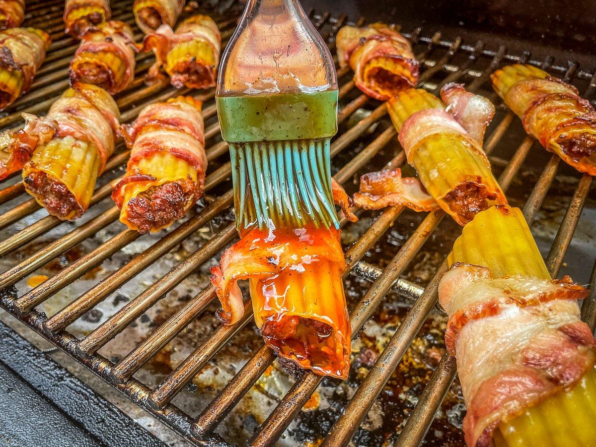 Brush the shells with your favorite barbecue sauce as they grill.