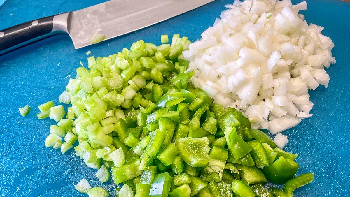 Start with chopped celery, onion, and bell pepper.