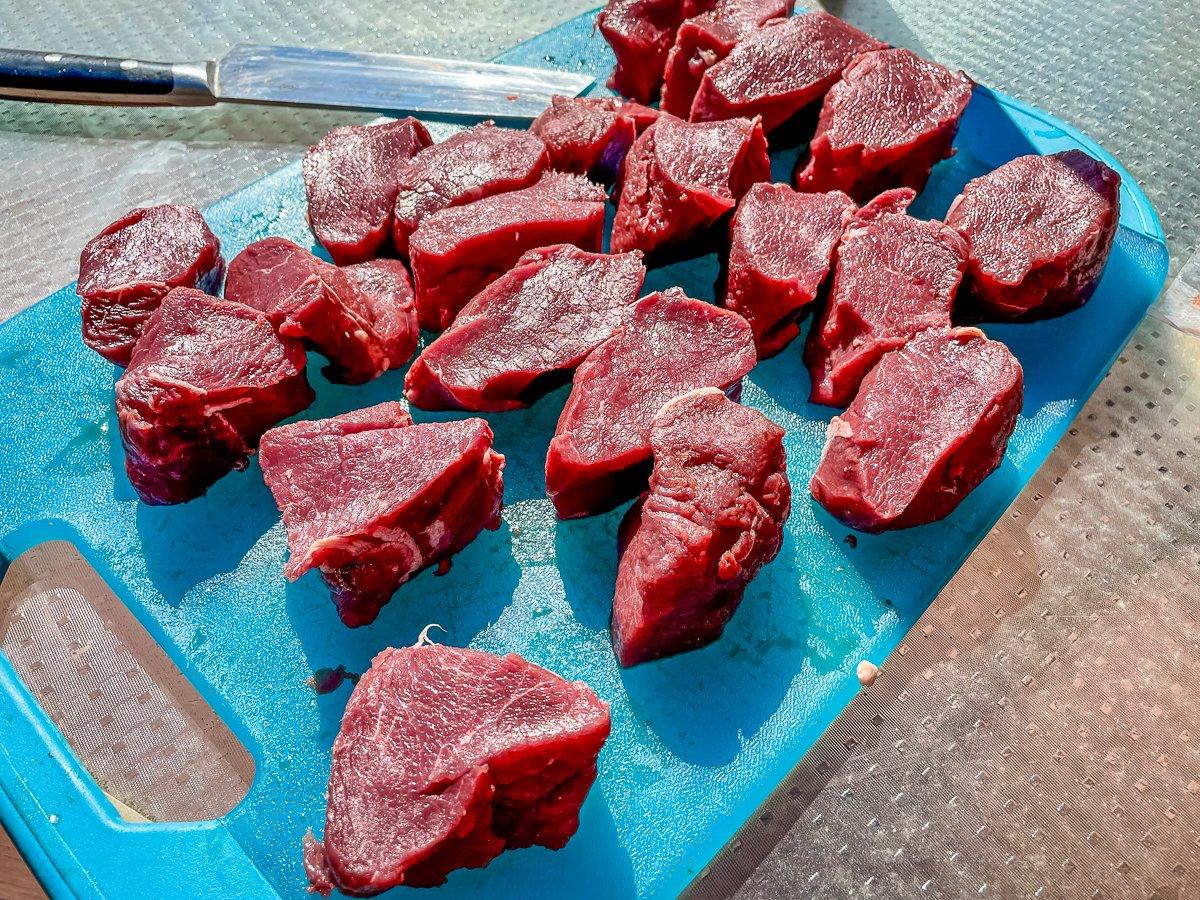 Slice the backstrap or other wild game steaks into thick medallions.