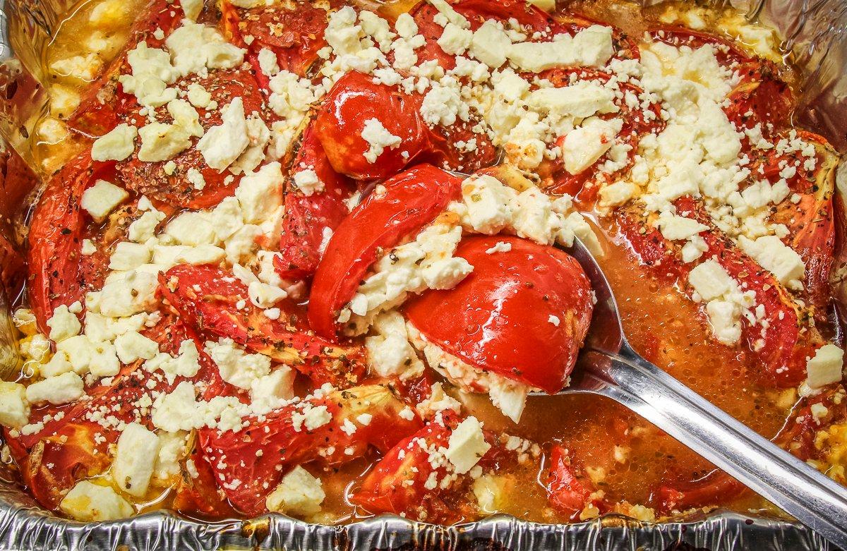 The feta cheese adds the perfect salty flavor to the grilled tomatoes.