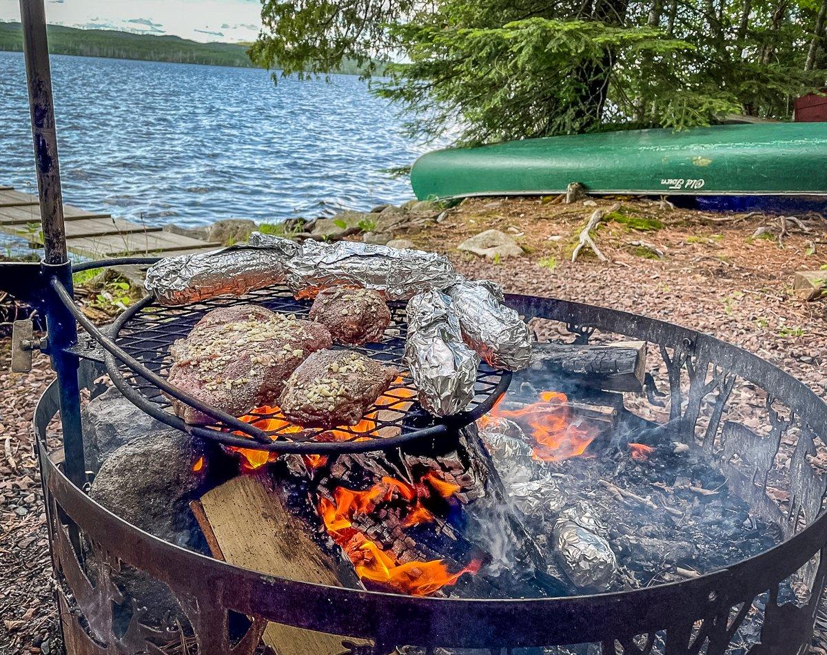 Grill the steaks over a hot open fire or on a hot grill but don't overcook them.