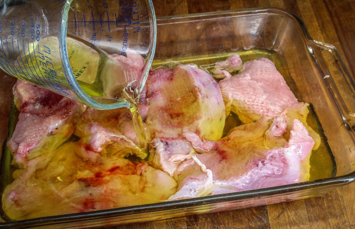 Slice the turkey breast into steaks, pound to tenderize, then marinate in pickle juice.