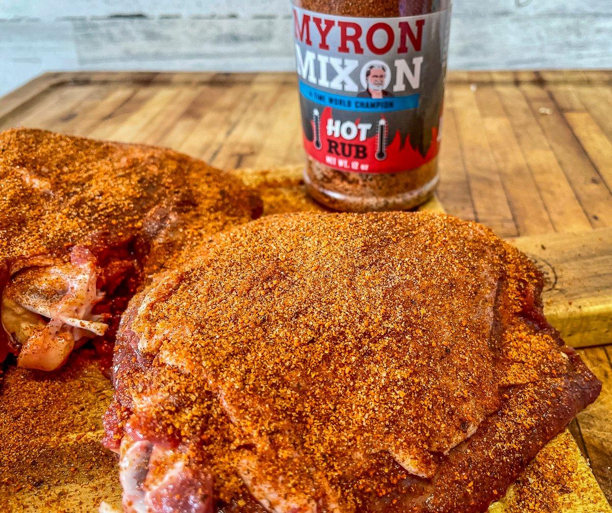 Season the thighs well with your favorite BBQ rub.