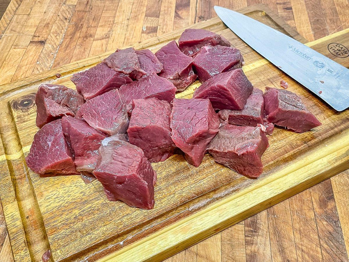 Cut the backstrap into roughly 1 1/2-inch cubes.