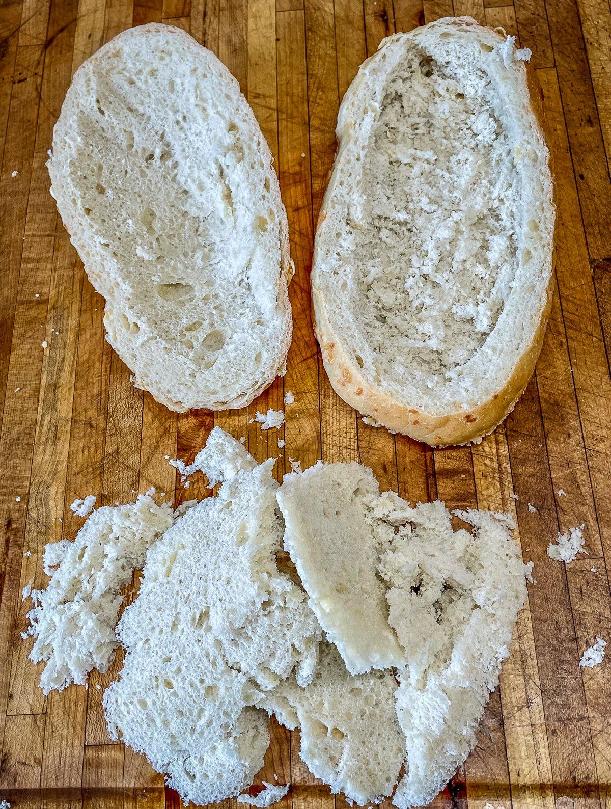 Hollow out a loaf of your favorite bread.