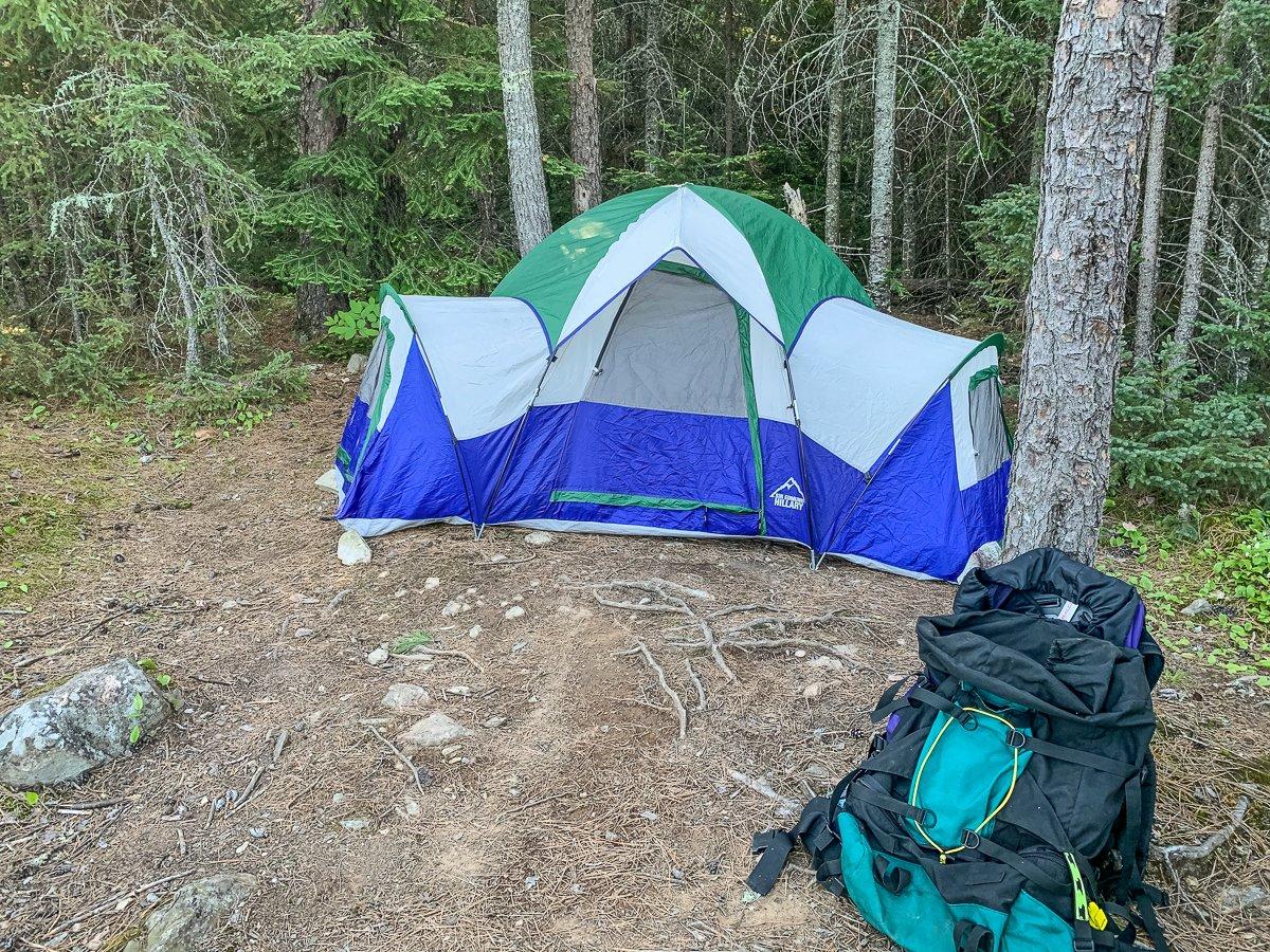 A tent or enclosed camping hammock provides shelter from mosquitoes at night. Image by Michael Pendley