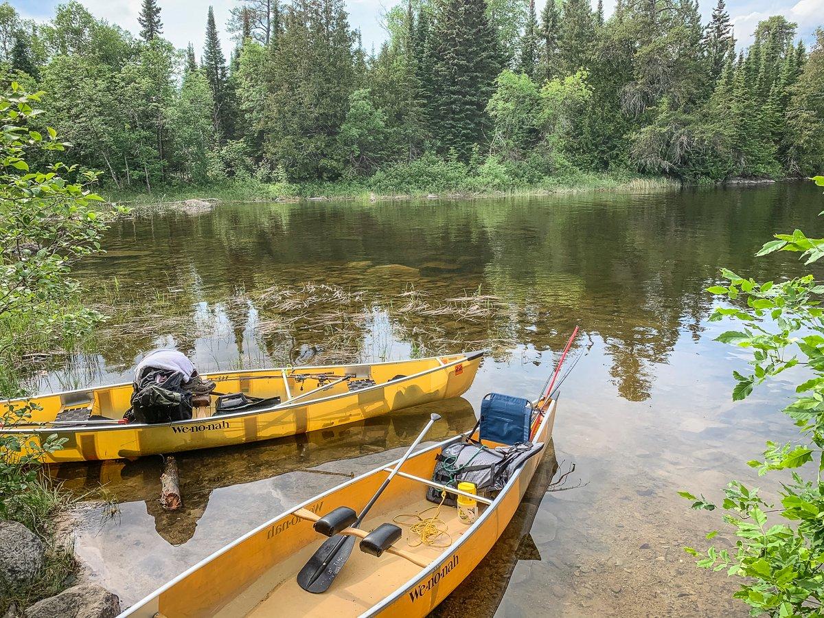 Campsites in protected bays will shield you from wind and waves but might have more mosquitoes. Image by Michael Pendley