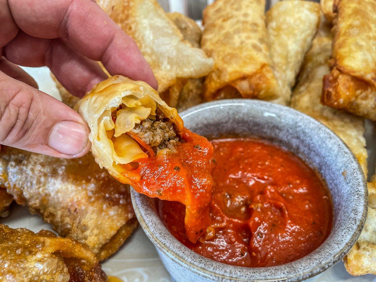 Serve the rolls with additional pizza sauce for dipping.