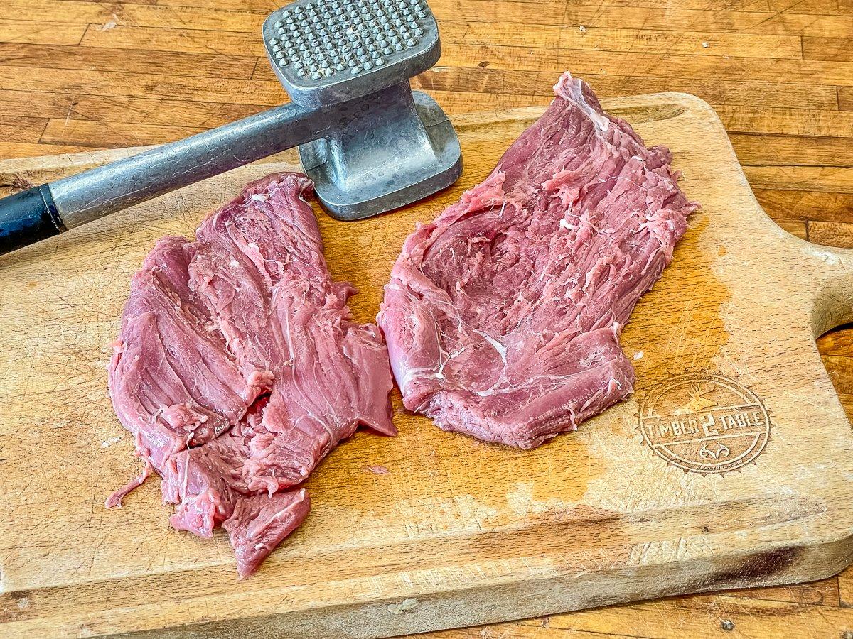 Pound the tenderloins flat with a meat mallet.