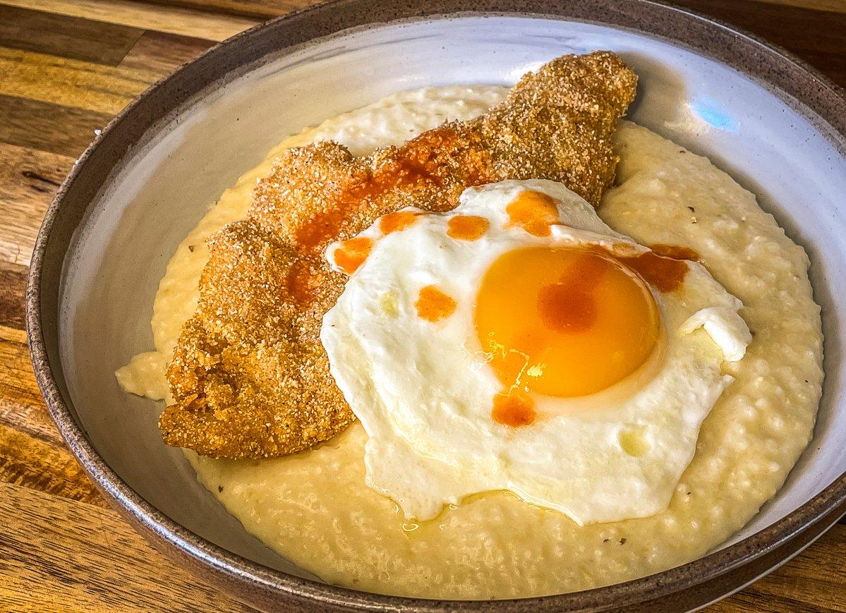 This combination of crispy fried catfish and creamy cheese grits make the perfect breakfast or brunch.