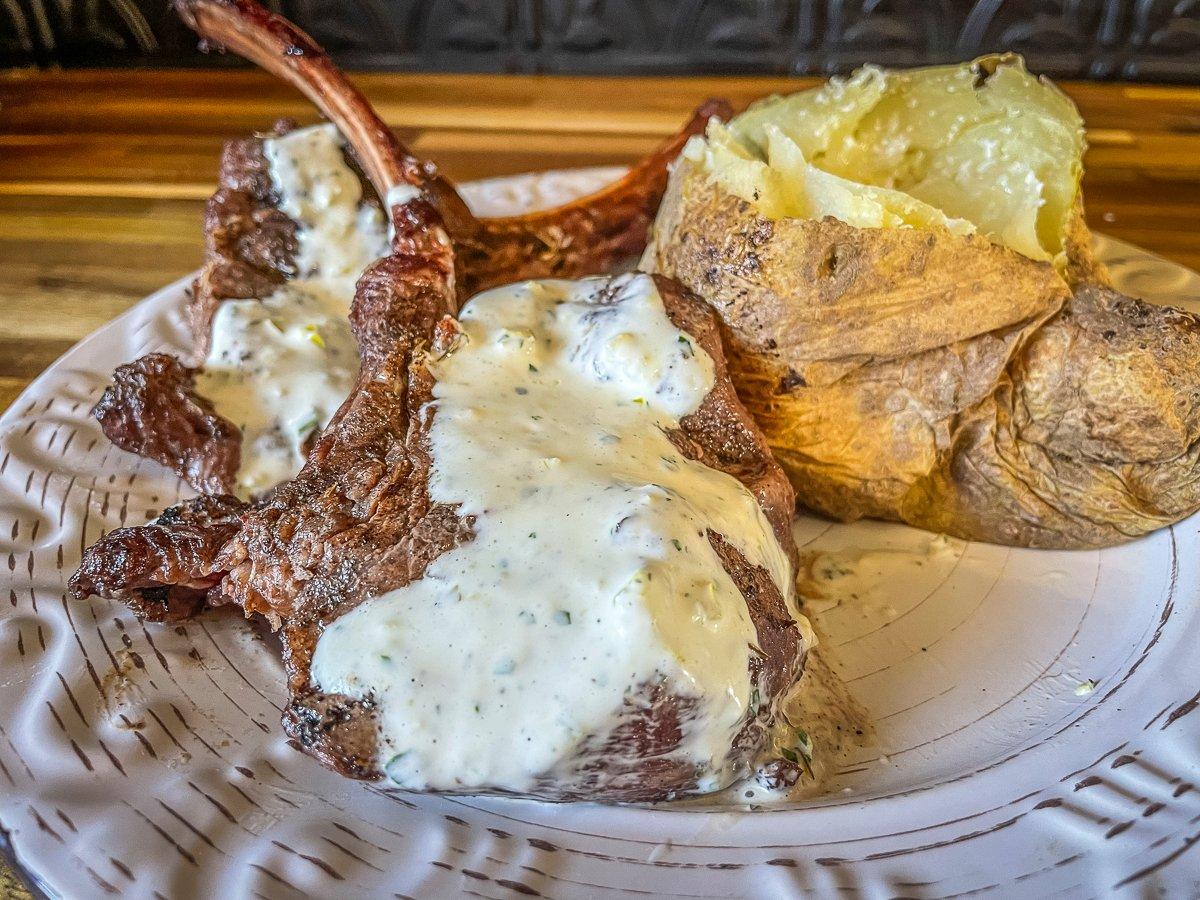 Spoon the jalapeño ranch sauce over the grilled elk chops.