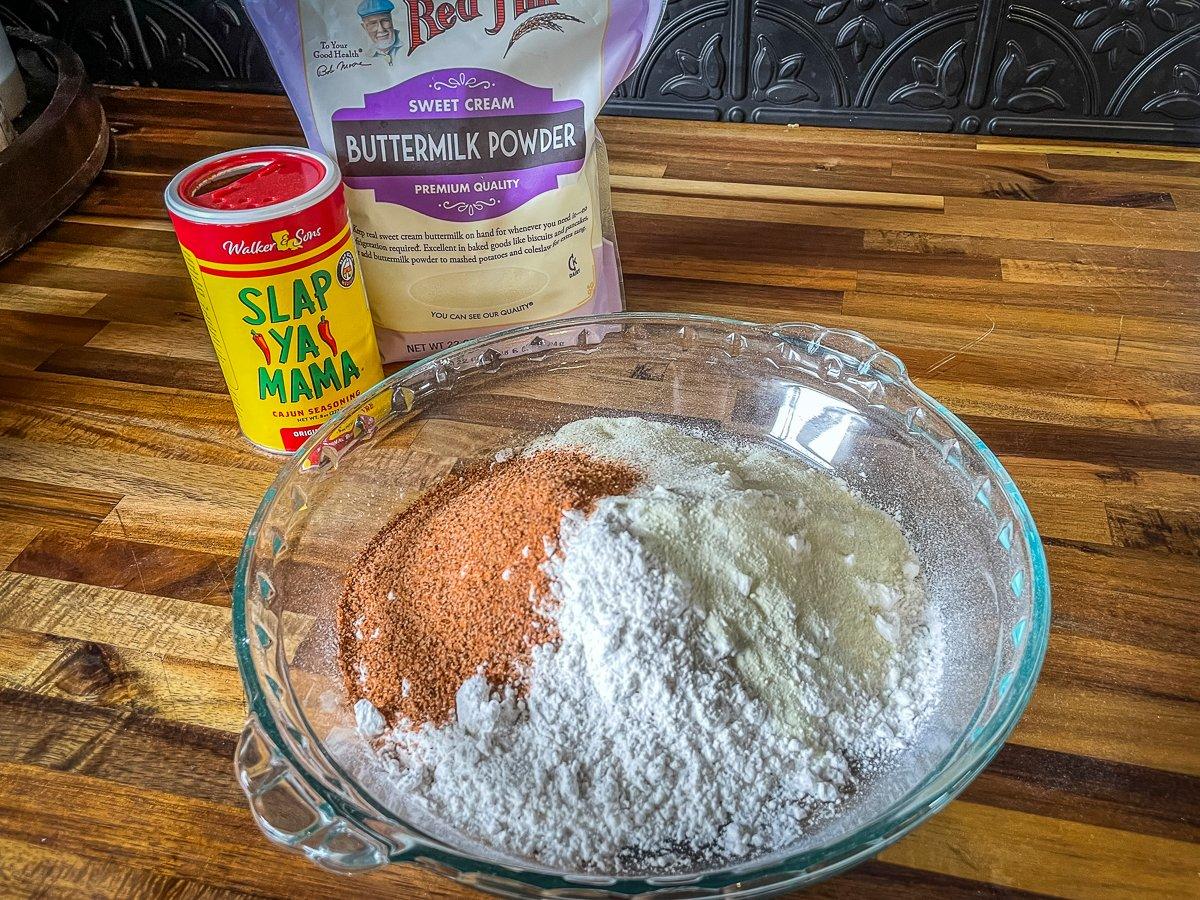 Mix the flour, Cajun seasoning and buttermilk powder.